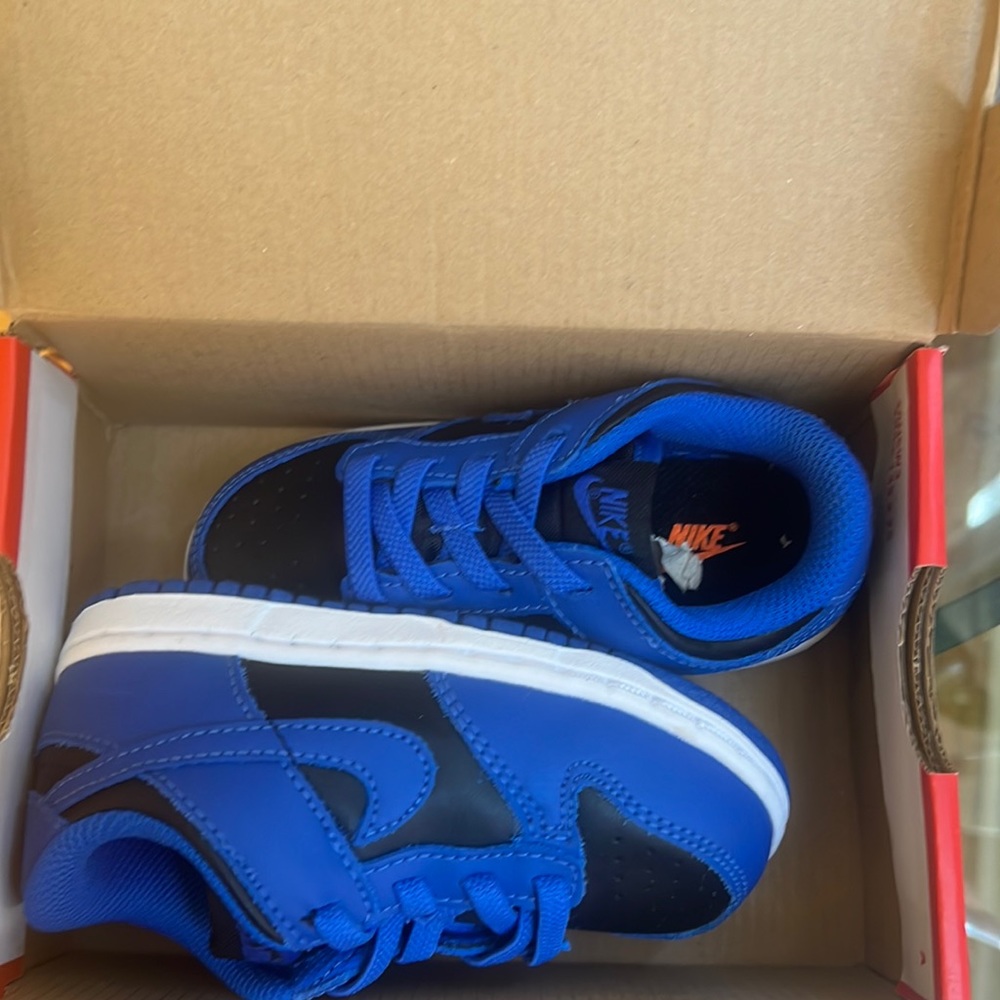 Size 8C (toddler size) low Nike Dunks university blue